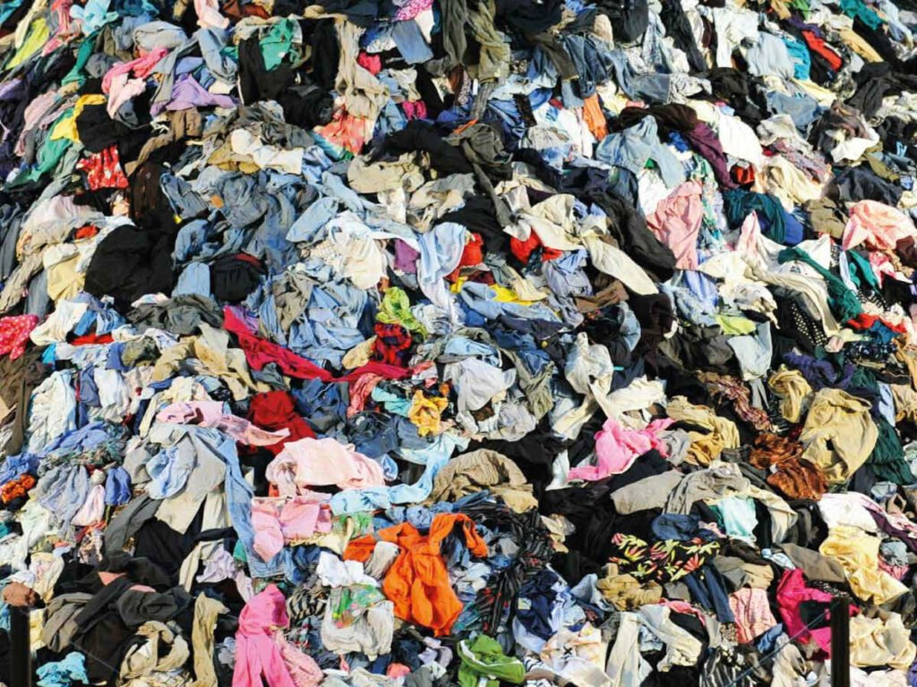 thrown away clothes pile